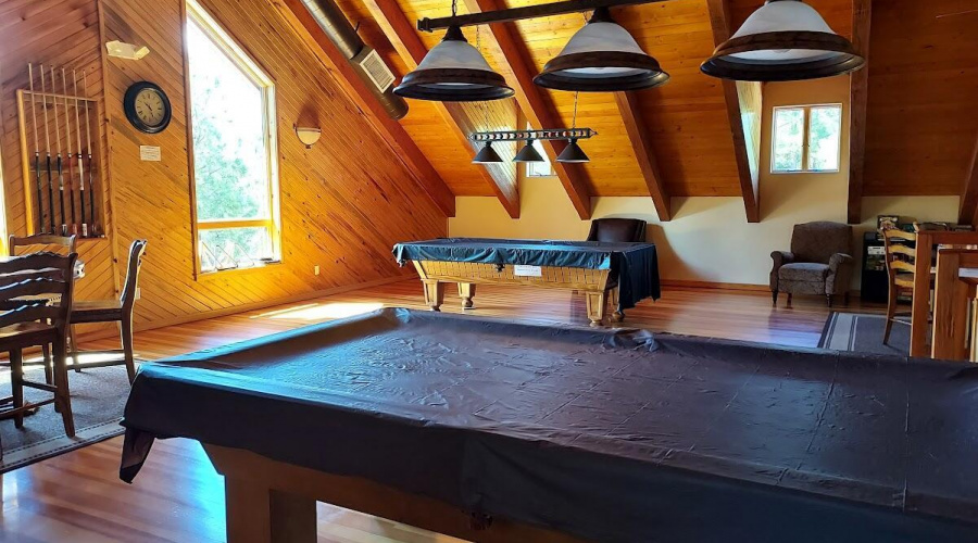 loft with pool tables in clubhouse