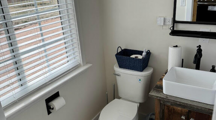 bathroom in guest house showing window