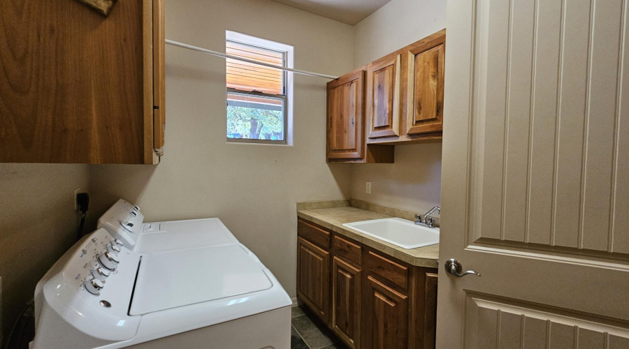 LAUNDRY ROOM WITH CABINETS