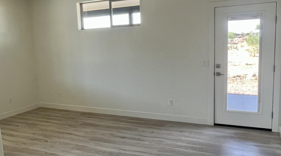 Main bedroom with door to patio