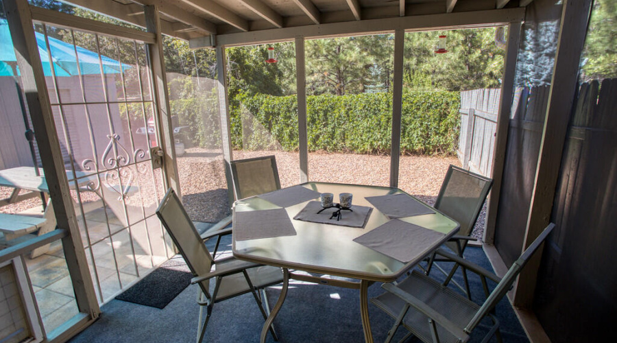 Screened-in covered back patio