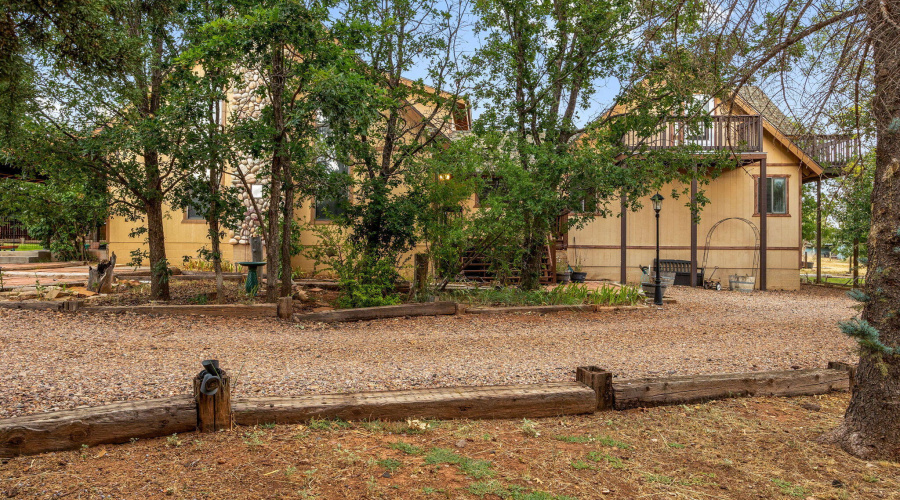 Front of home through the trees