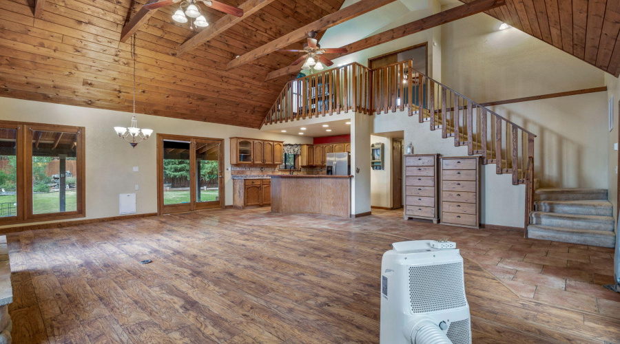 View to kitchen and upstairs f Great Rm