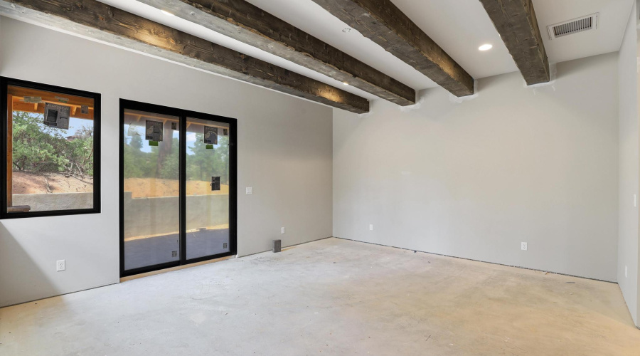 Primary Bedroom with Beamed Ceiling