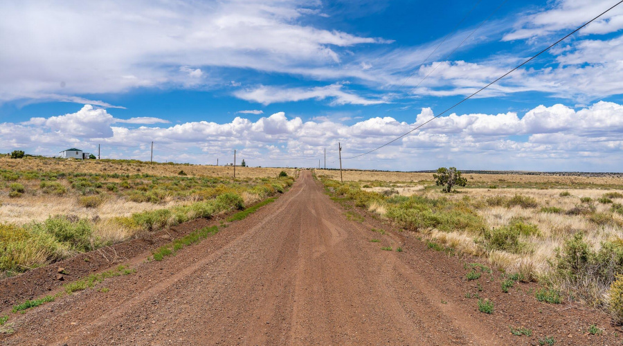 MAIN ROAD W PROP ON LEFT