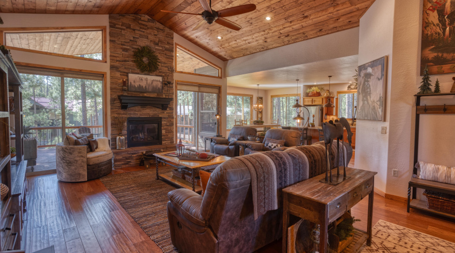 Gas fireplace flanked by large windows