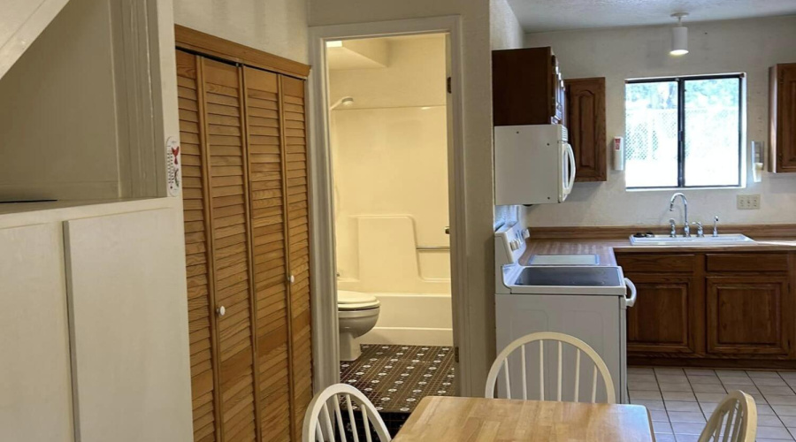 looking into kitchen down stairs bathroo