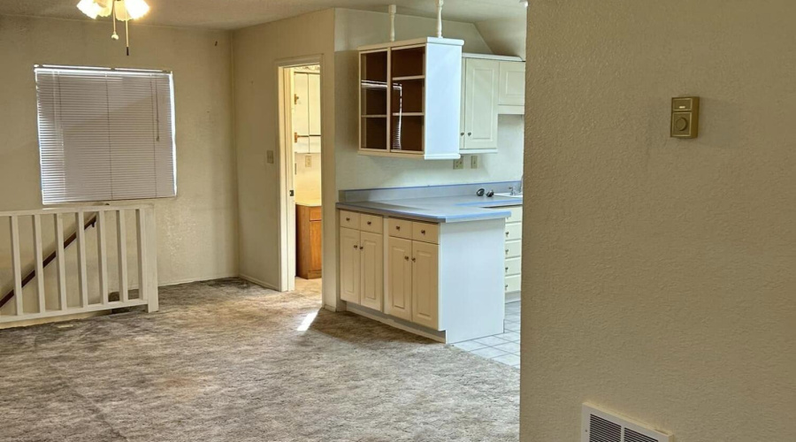 upstairs looking to bathroom and kitchen