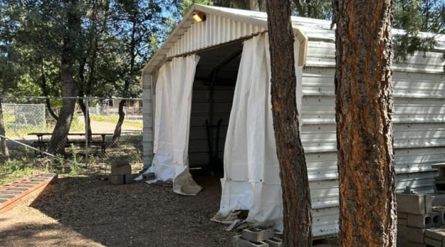 covered parking storage area. curtain do