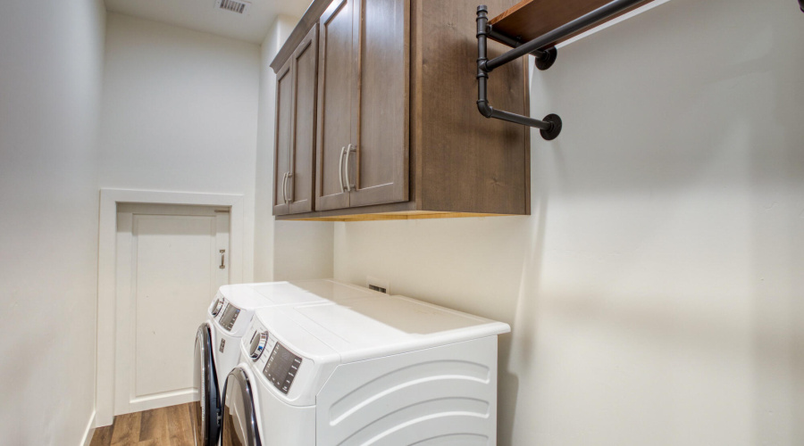 Laundry with cabinets