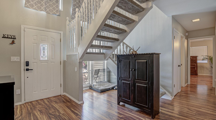 enterance to living room and upstairs