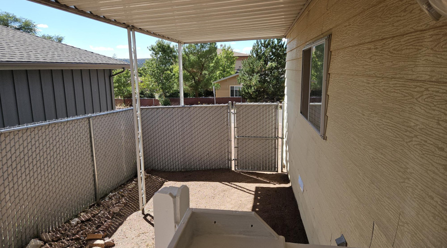 CARPORT LOOKING WEST