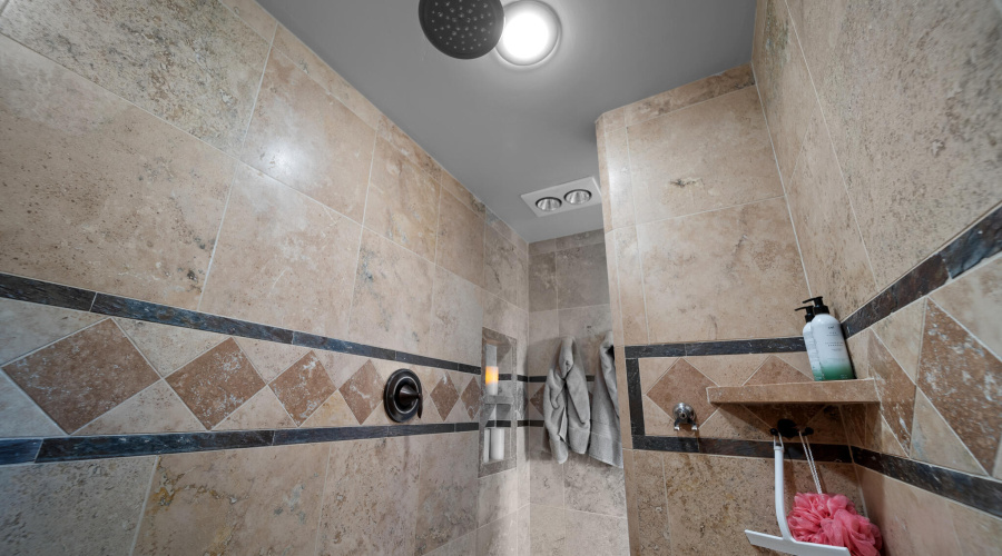 Walk-in Travertine Master Shower