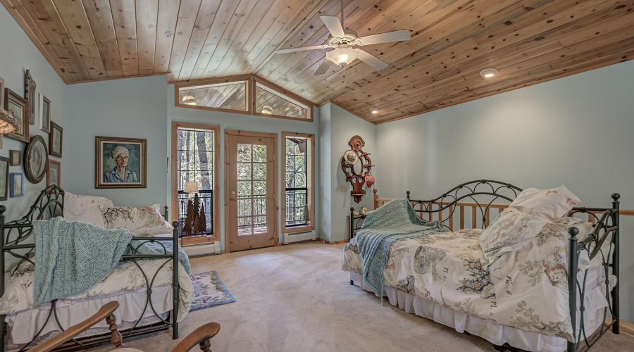 Upstairs bedroom looking at french doors