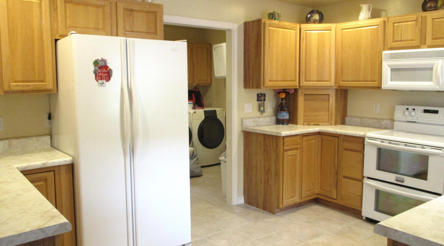 Kitchen to Utility Room & Half Bath