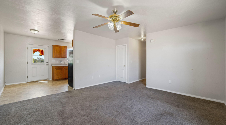 Living room facing kitchen