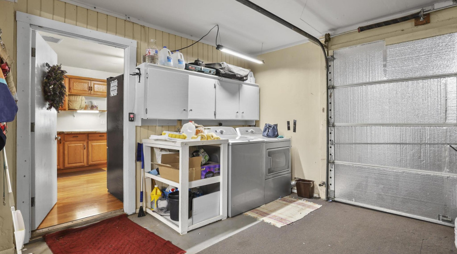 Laundry in the garage off kitchen