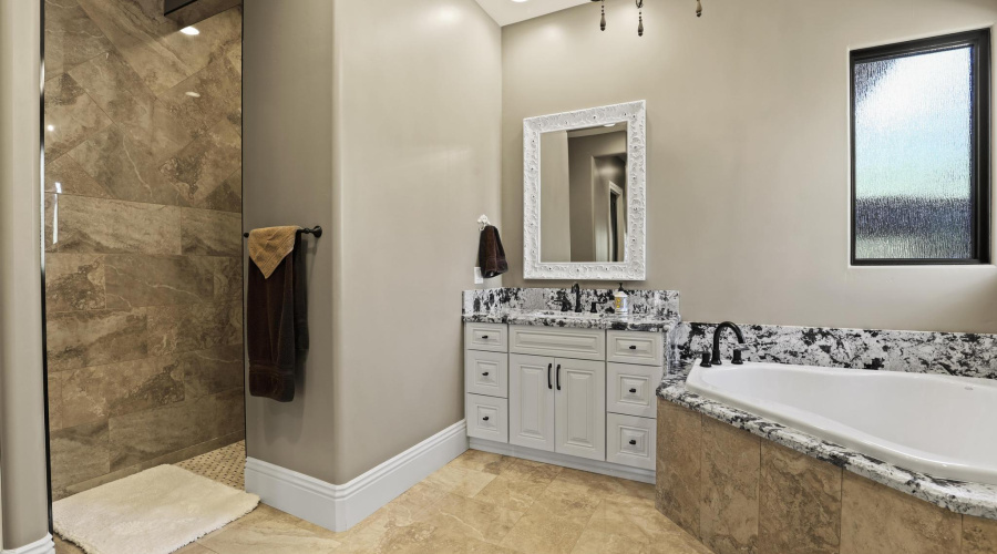 Separate Dual Vanities and Soaking Tub