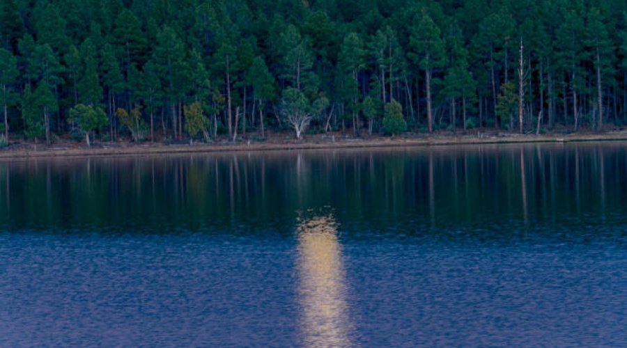 Beautiful full moon with lake reflection