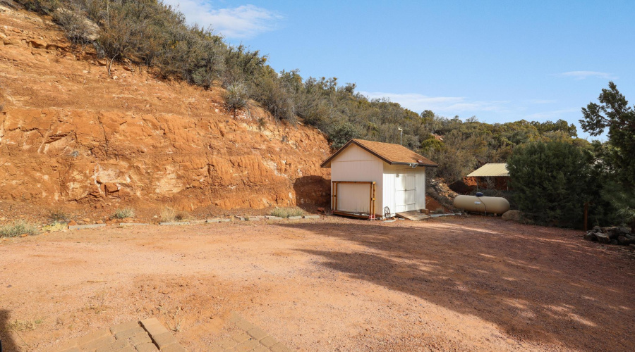 Parking area and storage shed