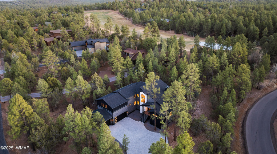 View Of Golf Course And House