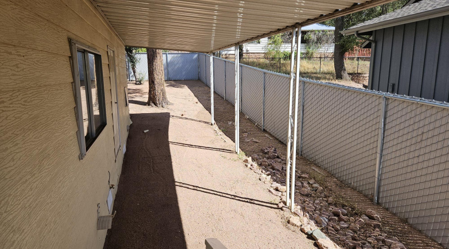 CARPORT LOOKING EAST