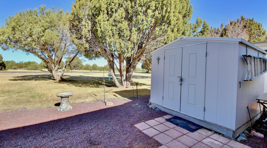 Back area, laundry shed and tool area.