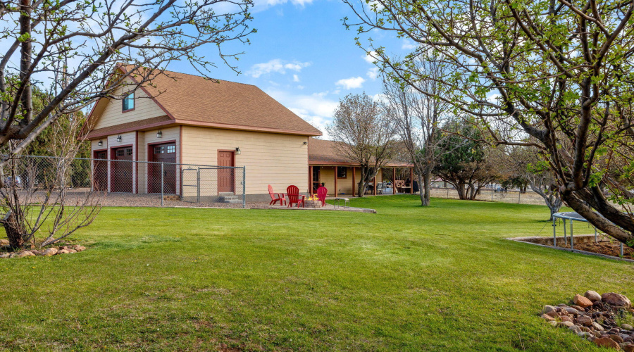 Yard view toward 3 car garage
