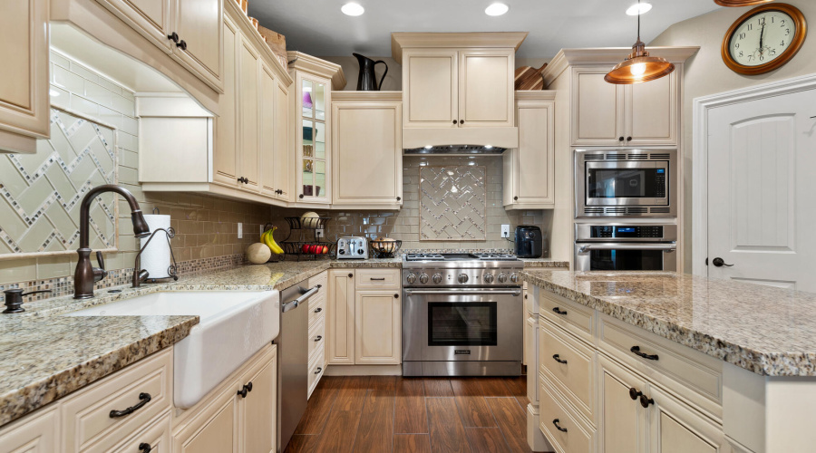 A kitchen gas range  & double oven