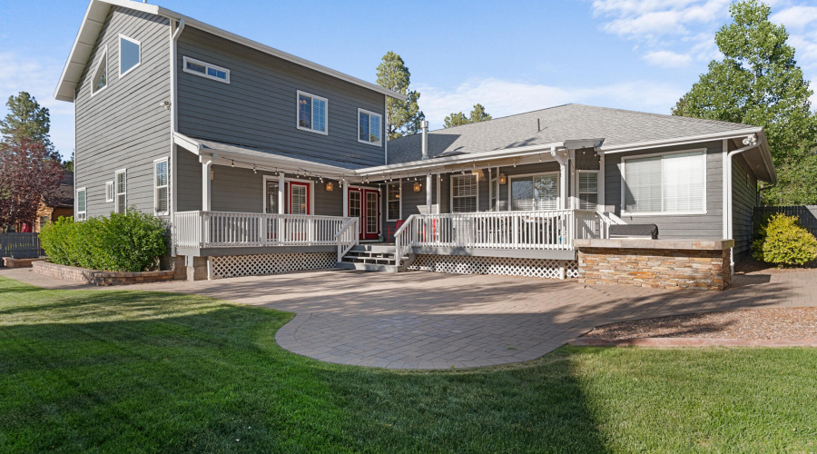 A rear view of house and yard