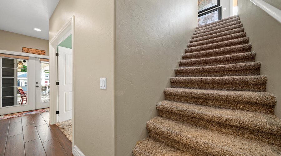 A stairs to 2nd floor & hall view to dec