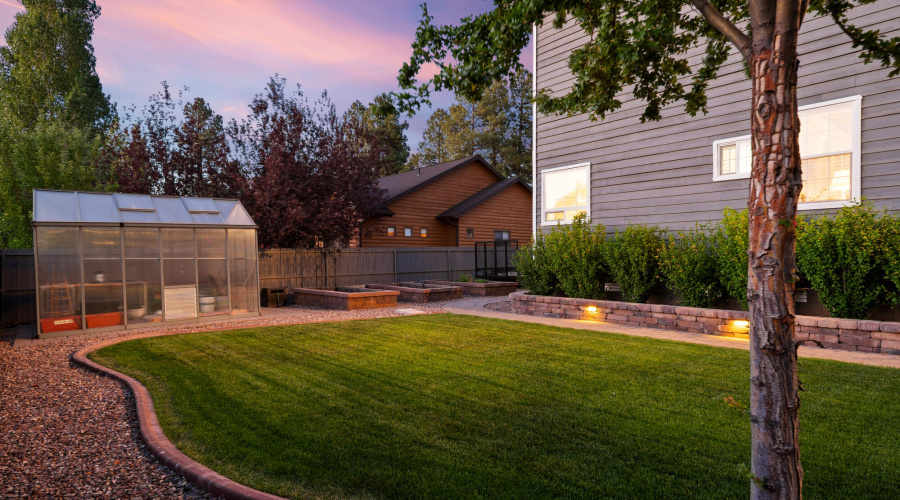 A twilight rear garden area view