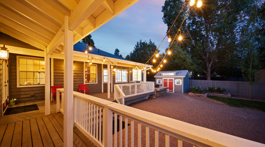 A twilight back yard view from deck