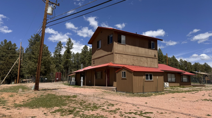 7 - Main house west side & storage shed