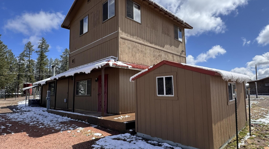 8 - Main house west side & storage shed