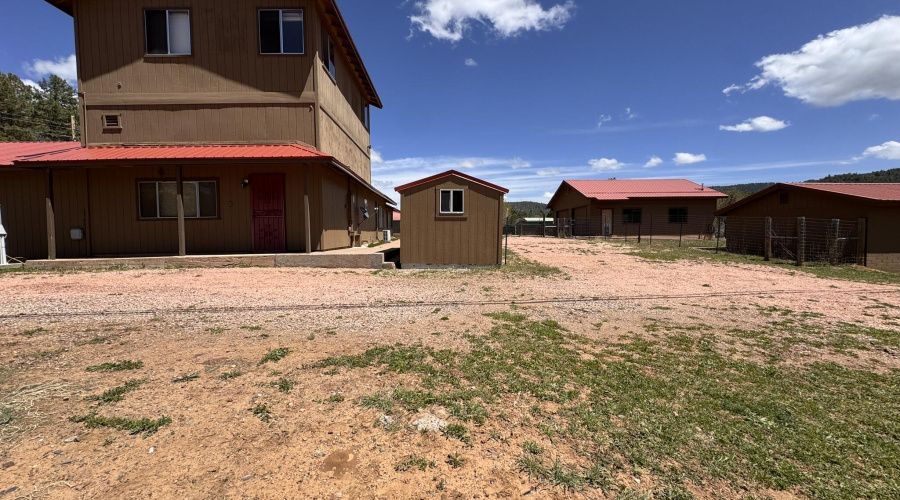 6 - Main home, shed, storage house and 2