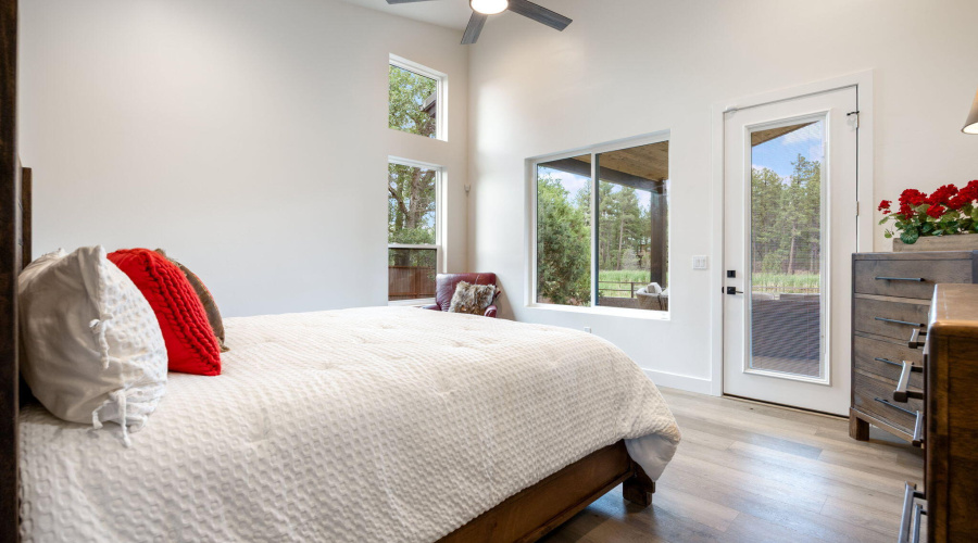 Master bedroom outlooking private pond