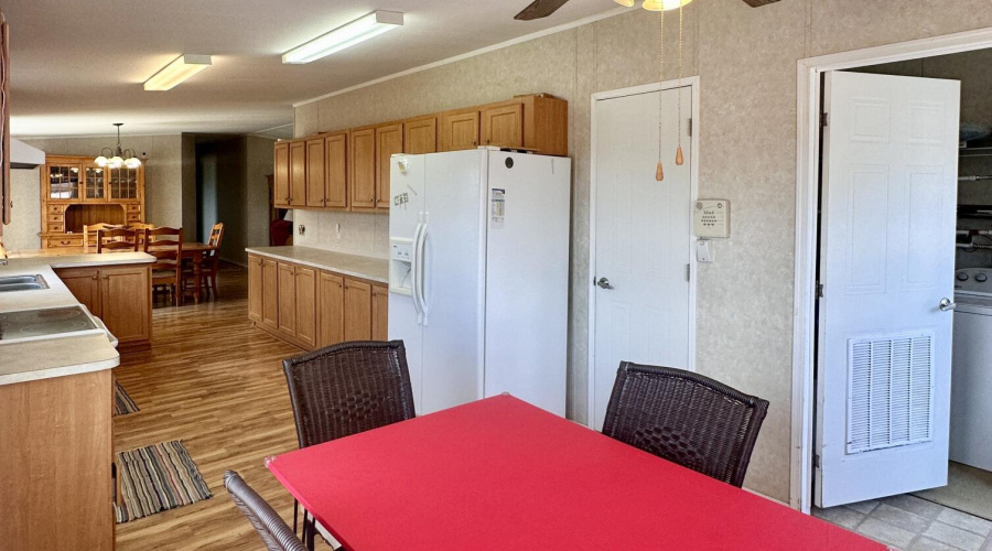 KITCHEN, PANTRY, LR EXIT TO CARPORT
