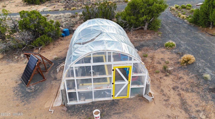 Green house w/ catfish pond