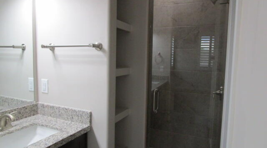 Linen storage and Walkin shower
