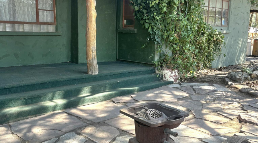 Front Porch & S End of Adobe Hm