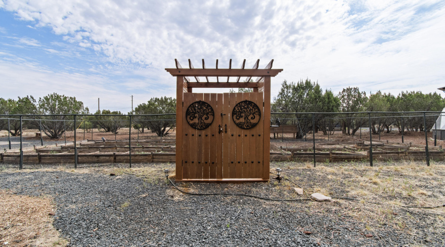 Entry to fenced garden area