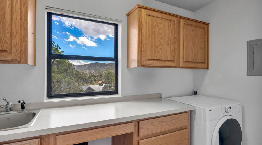 Laundry Room with Cabinets and Countersp