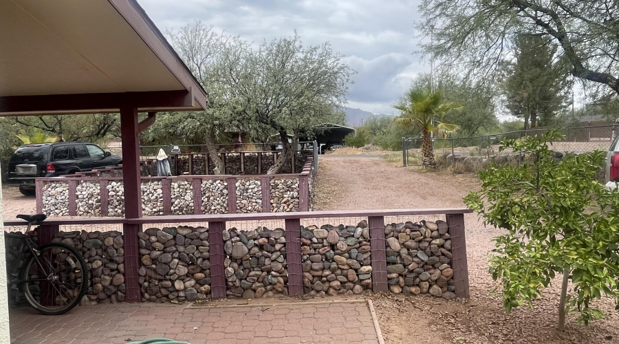 Separate rock fenced garden plot