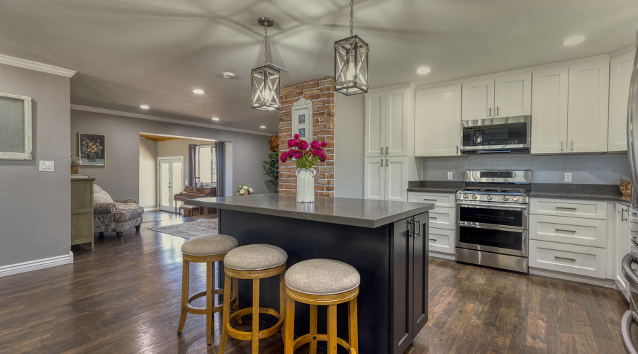 Kitchen with view into living room