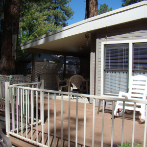 Front deck with bbq in the yard