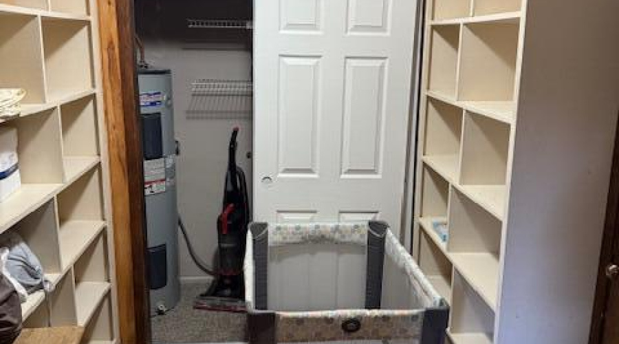 closet with hot water heater