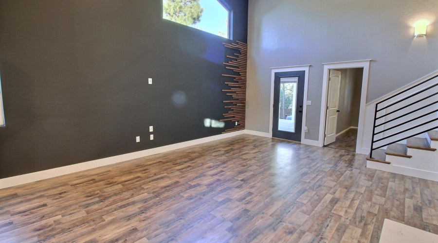 Great room leads to Primary Bedroom