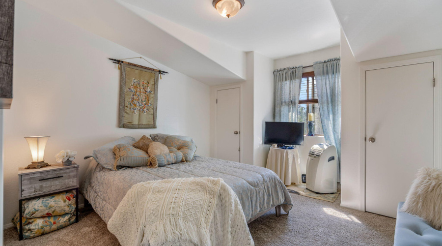 Guest bedroom with picture window