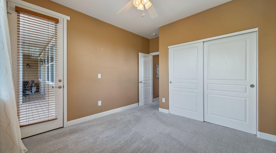 Bedroom 2 with Door to Back Deck